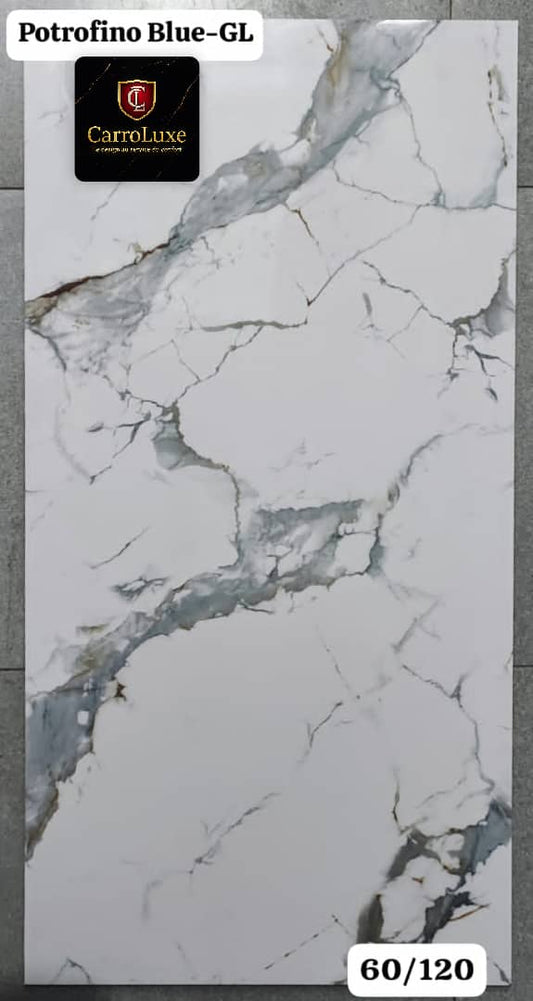 Apportez une touche de luxe à vos espaces avec le carrelage Potrofino Blue-GL de CarroLuxe. Son design effet marbre aux veines bleu-gris sophistiquées transforme chaque pièce en une œuvre d’art. Idéal pour salons, salles de bains, cuisines ou halls, ce carrelage grand format (60x120 cm) allie raffinement, résistance et facilité d’entretien.
✅ Finition brillante haut de gamme
✅ Esthétique marbrée unique
